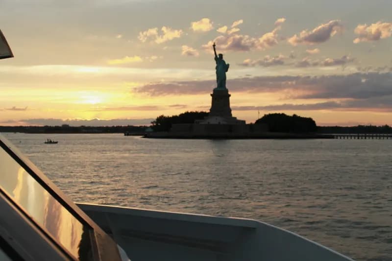 Statue of Liberty framed through a salon window